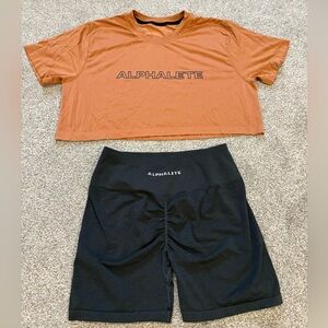 Alphalete Women’s Rust Crop Top and Black Amplify Shorts Outfit